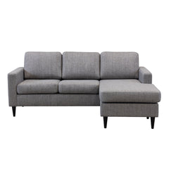 Ancona L 3FS -divaanisohva koottuna oikeanpuoleisella divaanilla (divaani käännettävissä). Sohva on verhoiltu harmaanruskealla Tuuru Basic 489 -kankaalla ja siinä on mustat puujalat.