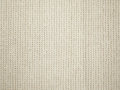 Lähikuvassa Anna-villamaton vallkoista pintaa.