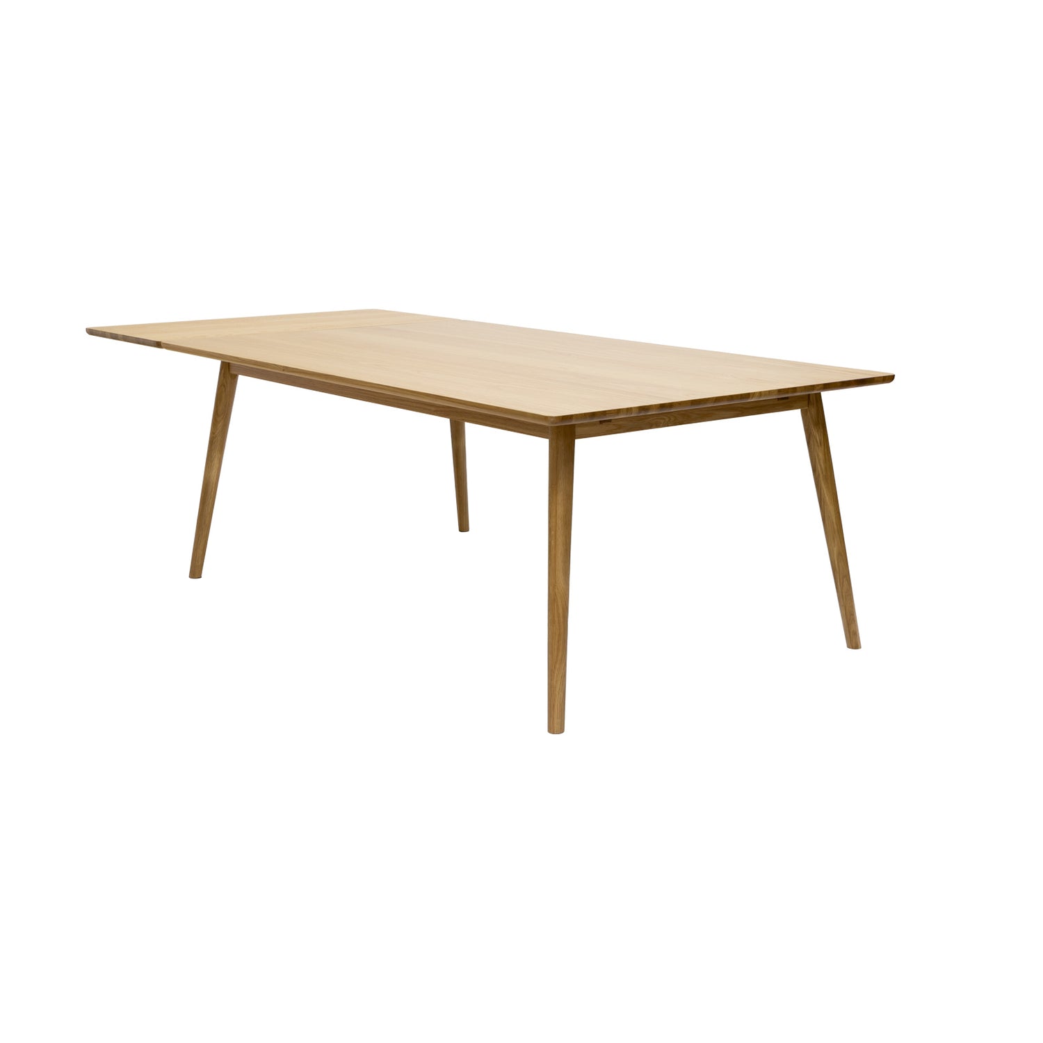 Kuvassa on erikseen ostettava Barrali-ruokapöydän jatkolevy kiinnitettynä 190 x 90 cm Barrali-ruokapöytään, jolloin pöydästä on saatu 235 cm. Levy voidaan kiinnittää pöydän jompaankumpaan päätyyn.
