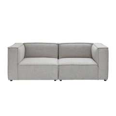 3 h Beacon-sohva hiekanvärisellä Boucle Crush -kankaalla. Beacon-moduulimallistossa on matalat mustat jalat.