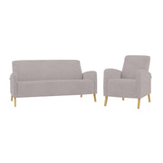 Kuvassa on Fanni 3-istuttava sohva ja erikseen myytävä Fanni-nojatuoli. Verhoiluna molemmissa sohvakalusteissa on hiekan värinen Barcelona 10 -kangas ja jalat ovat luonnonväristä tammea.