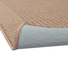 Sileäksi kudottu Fanni-matto, beige. Kuvassa näkyvissä maton pohjaus.