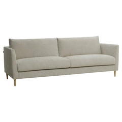 3-istuttava 232 cm Halla-sohva harmaanbeigellä Vogue 04 -kankaalla. Luonnonväriset 14 cm pyöreäkartiopuujalat.