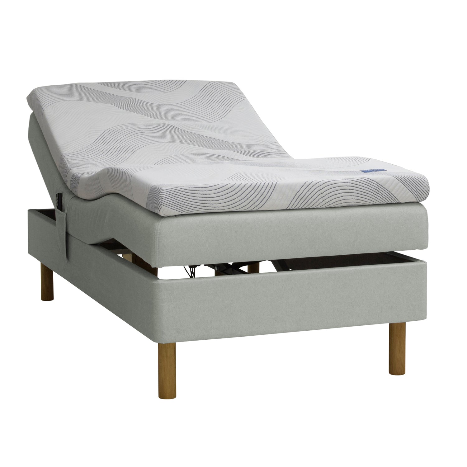 Kuvassa on harmaa Tunnel 17 -kangasverhoiltu Heaven By Unico Revive -moottorisänkypaketti. Pakettiin kuuluu Revive-säätörunko ja Revive 8 Nano Cool™-verhoiltu Memory -ergosijauspatja sekä pyöreät tammenväriset puujalat.