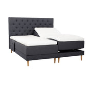 Antrasiitinväriset Hilding Cross -moottorisängyt tammenvärisillä Hilding Raita -tammijaloilla, erillisillä Hilding Ergo -sijauspatjoilla ja Hilding -tarviketaskulla. Kuvan Cross -sängynpääty myydään erikseen.