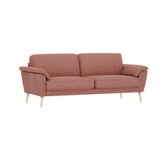 3-istuttava Ilona-sohva leveillä tyynyillä punaisen/roosanvärisellä Otaru 324 -kangasverhoilulla. Kuvan sohvassa on 20 cm leveät KN20-käsinojat ja 18 cm korkeat puiset valkoiset pyöreäkartiojalat.