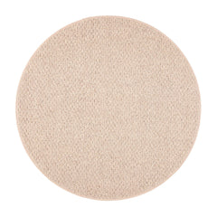 Pyöreä Loimu-villamatto värissä beige/greige.