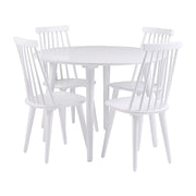 Kuvassa on neljä valkoista Lotta-pinnatuolia Rowicon valkoisen Lotta-ruokapöydän kanssa.