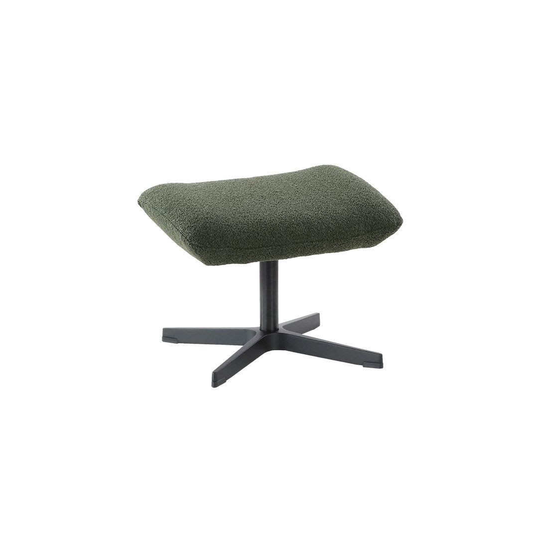 Lotus-rahissa on metallinen musta Vision -ristikkojalka ja vihreä Alpine Forest 438 -kangasverhoilu.