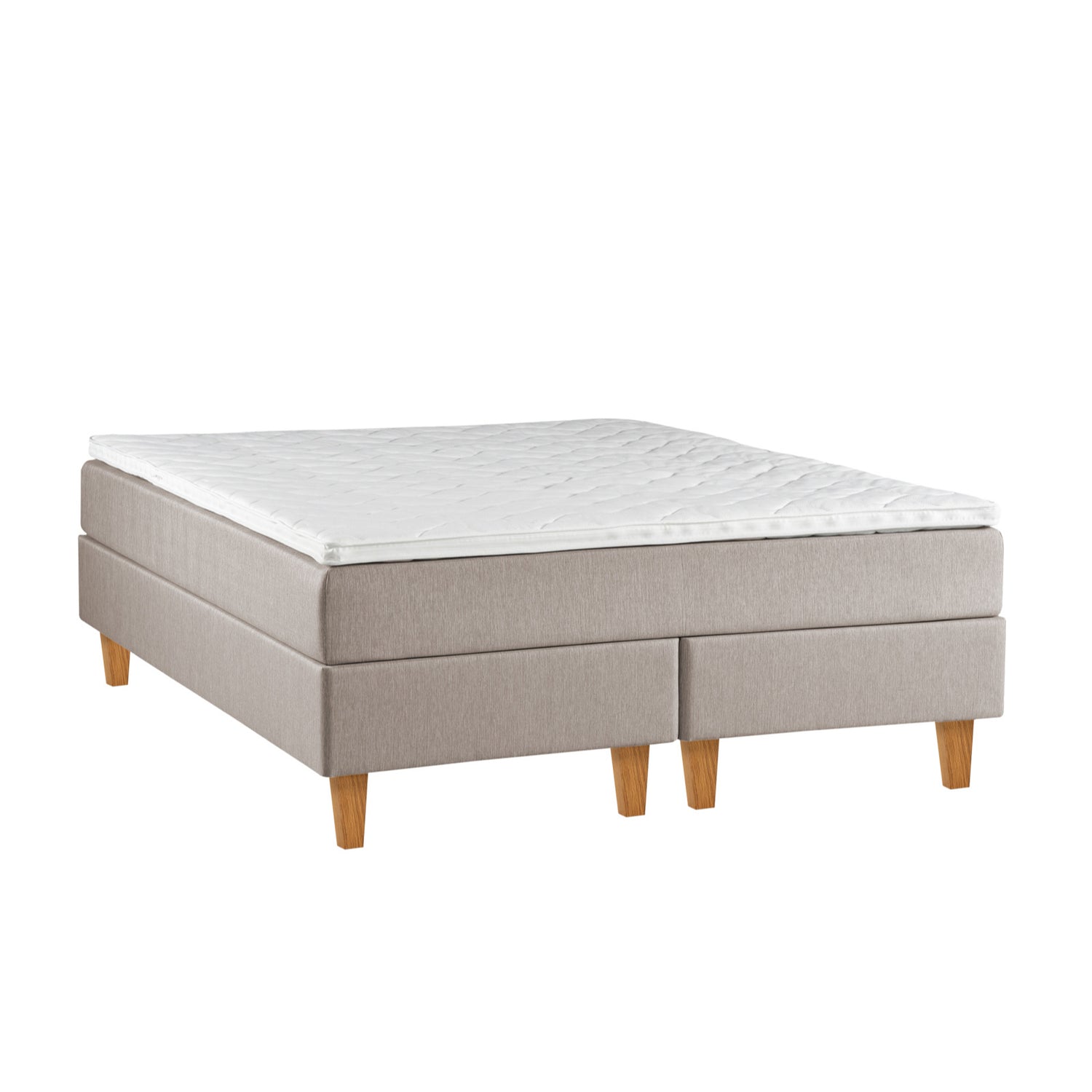 Beigenvärinen Ranta-jenkkisänky luonnonvärisillä Royal-tammijaloilla ja valkoisella profiloidulla sijauspatjalla.