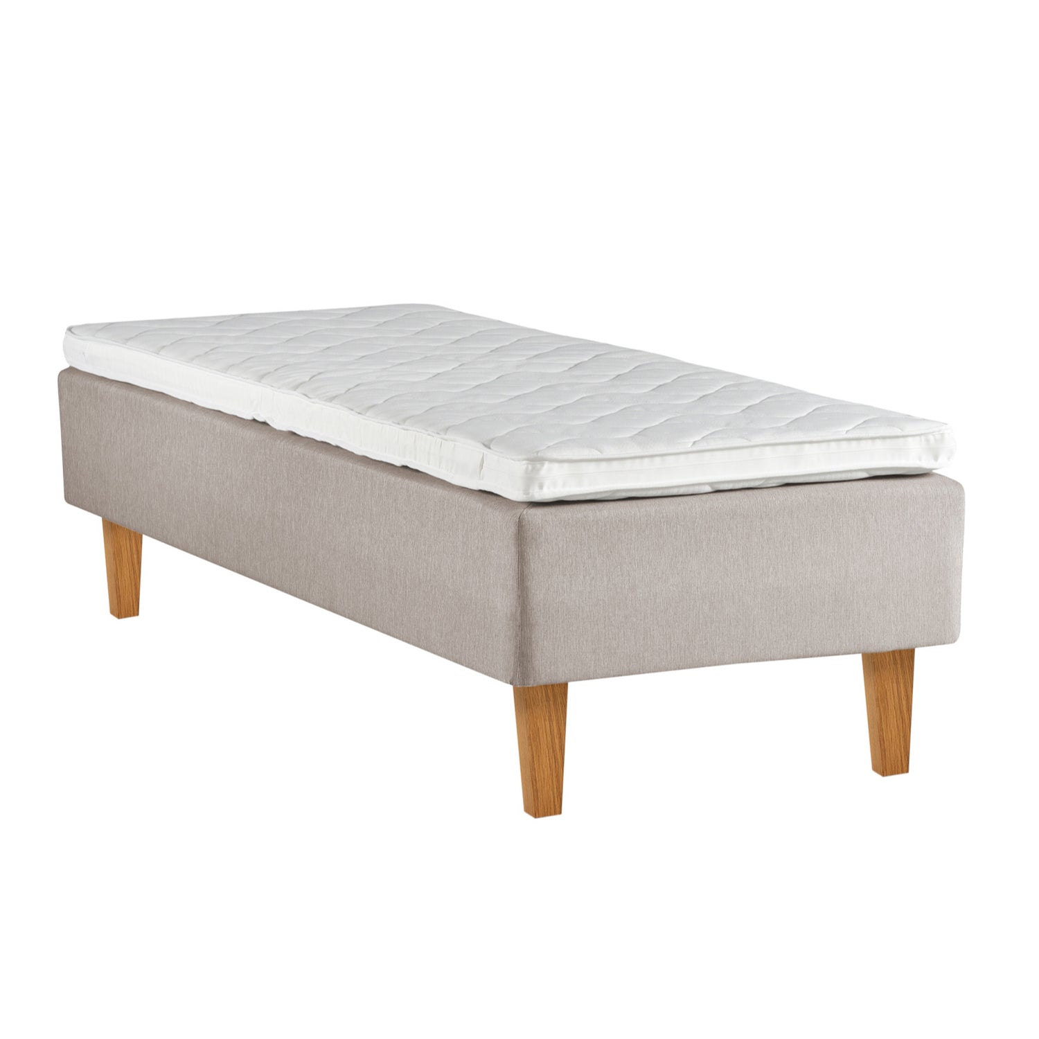 Beige Ranta-runkopatja luonnonvärisillä Royal-tammijaloilla ja profiloidulla valkoisella sijauspatjalla.