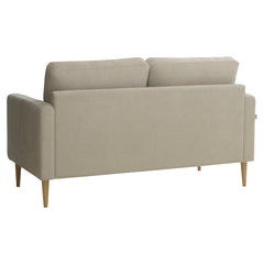 Kahden istuttava Mila-sohva hiekanväriselllä Feel 05 -kankaalla ja luonnonvärisillä pyöreäkartion mallisilla jaloilla.