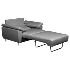 Salla-vuodetuoli harmaalla Minco 16-kangasverhoilulla ja luonnonvärisillä puujaloilla. Helppokäyttöinen vuodemekanismi on nopea levittää yhdelle nukkujalle.