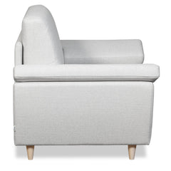 Salla-vuodetuoli vaalealla Minco 2-kangasverhoilulla ja luonnonvärisillä puujaloilla.