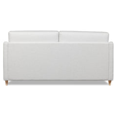 Salla-vuodesohva vaalealla Minco 2-kangasverhoilulla ja luonnonvärisillä puujaloilla.