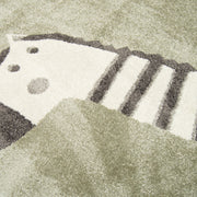 Vaaleanvihreässä Seepra-matossa seikkailee vekkuli mustavalkoinen seepra.