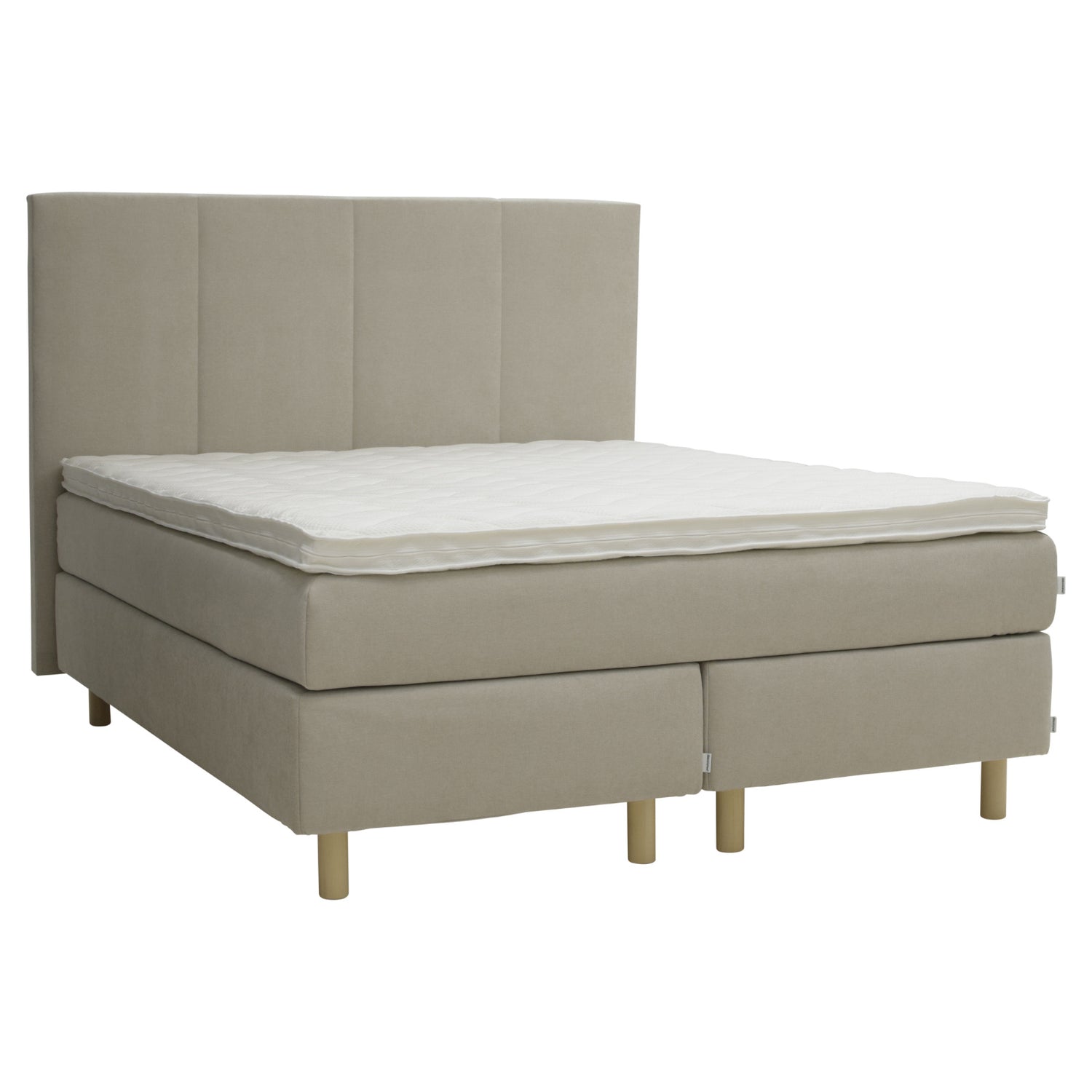 Juhlajenkki Sonaatti -jenkkisänkypaketti verhoiltuna beigellä Feel 05 -kankaalla. Valkoinen Relax-petauspatja ja luonnonväriset pyöreät tolppajalat, sekä Heaven by Unico Gold -sängynpääty kuuluvat pakettiin.