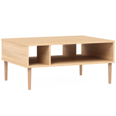 Tammenvärinen Stemma-sohvapöytä luonnonvärisillä tammijaloilla.