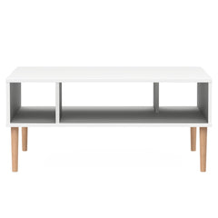 Kokovalkoinen Stemma-sohvapöytä luonnonvärisillä tammijaloilla.