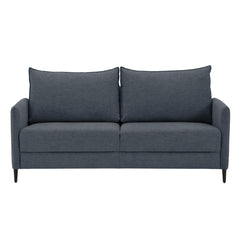 Stockholm Max Hybrid Deluxe 2-istuttava-vuodesohva sinisellä Oasis 12 -kankaalla. Vuodesohvassa on wengen väriset koivujalat.