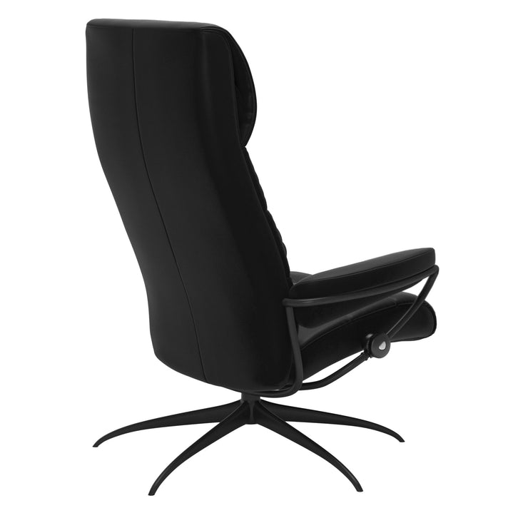 Stressless London, korkeaselkänojainen -lepotuoli mustana: Black 19  Paloma-nahkaverhoilulla ja mattamustalla Star-metallijalustalla.