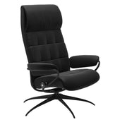 Stressless London, korkeaselkänojainen -lepotuoli mustana: Black 19  Paloma-nahkaverhoilulla ja mattamustalla Star-metallijalustalla.
