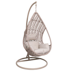 Beige Suvi-riippukeinu. Harmaanbeigen väriyhdistelmäsävy korissa on tarkemmin greige ja pehmusteet ovat vaalean beiget.