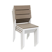 Käsinojaton Suvi Aintwood -tuoli, väri beige/valkoinen. Pinottava malli menee pieneen tilaan varastossa.