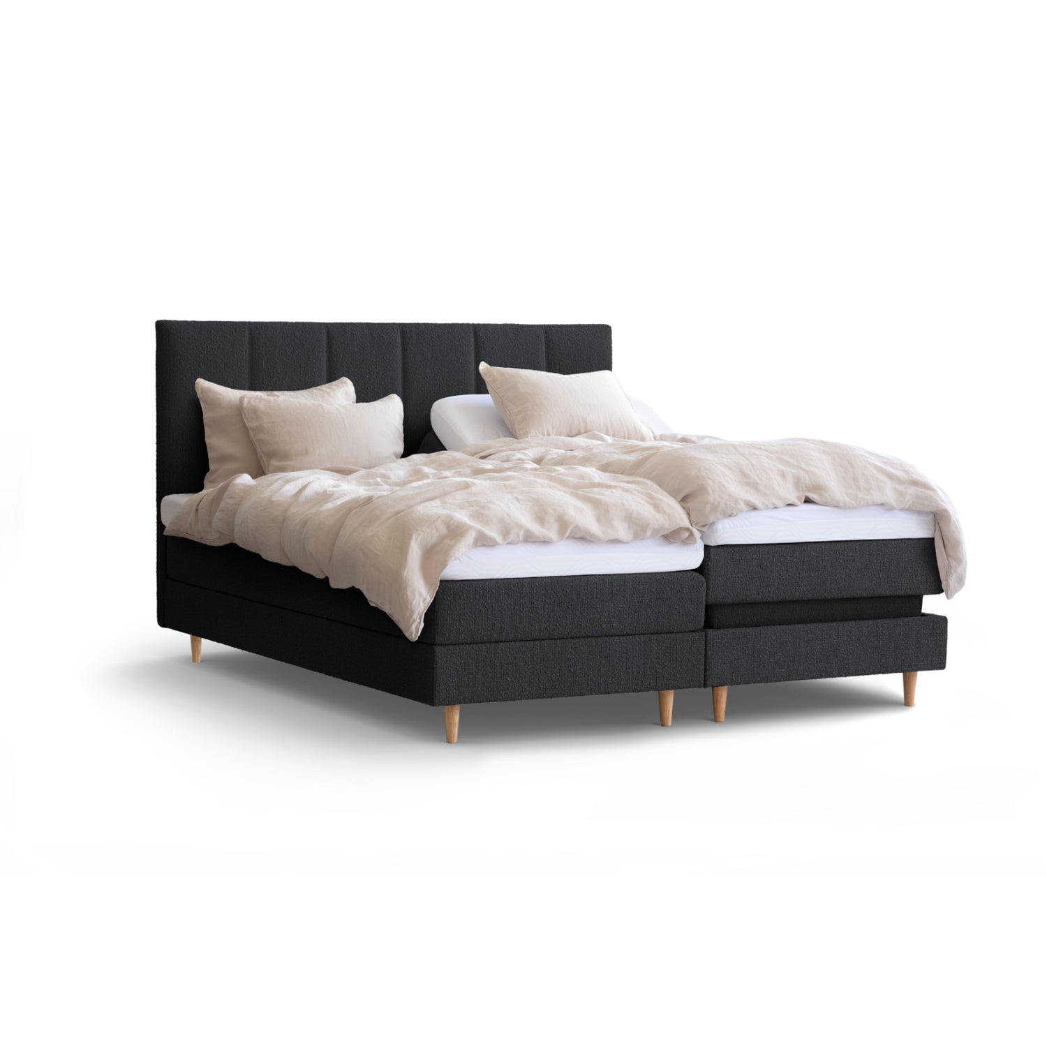 Tempur Break Adjustable -säätösänky grafiitinvärisellä verhoilulla ja tammijaloilla. Kuvan Tempur Break Square -sängynpääty ja petivaatteet myydään erikseen.