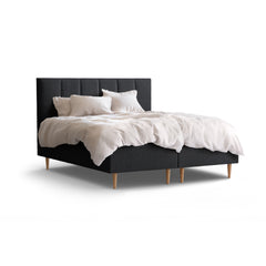 Tempur Break Box -runkosänkypaketti grafiitin värisellä verhoilulla ja tammijaloilla. Kuvan Tempur Break Square -sängynpääty ja petivaatteet myydään erikseen.