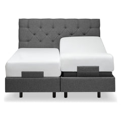 Kuvassa on Tempur Boxspring Adjustable -parivuodepaketti grafiitin värisellä Dark Stone -kankaalla verhoiltuna ja TEMPUR PRO Plus CoolQuilt 27 cm patjalla, sekä tummilla vakiojaloilla. Kuvan sängynpääty myydään erikseen.