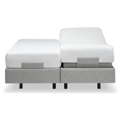 Tempur Boxspring Adjustable -parivuodepaketti harmaalla Stone -kankaalla verhoiltuna ja TEMPUR PRO Plus CoolQuilt 27 cm patjalla, sekä tummilla vakiojaloilla.
