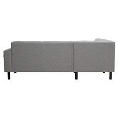 Divaallinen Tessa-avokulmasohva harmaalla Land 90 -kankaalla, 20 cm leveällä käsinojalla ja mustilla 18 cm pyöreäkartiopuujaloilla.