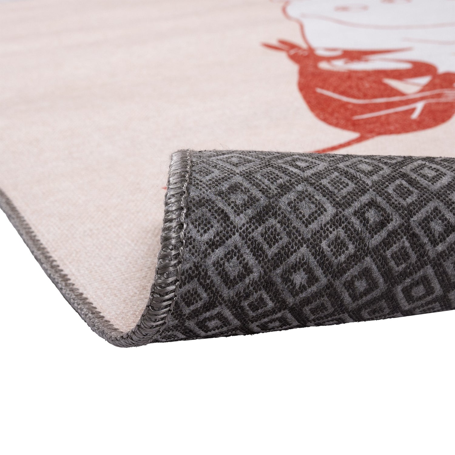 TUUMAUSTAUKO Muumi lasten matto, beige - materiaalin, pohjauksen ja reunan detaljikuva.