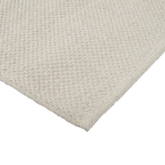 Lähikuvassa Ulappa-puuvillamatto, harmaa.