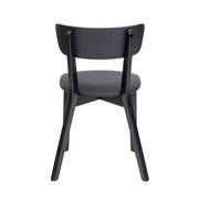 Musta Vera-tuoli PU-keinonahkaverhoillulla pehmustetulla istuimella.