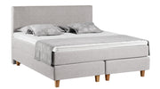 Kuvassa on Aava-sängynpäädyn lisäksi erikseen myytävä Aava Limited Edition -jenkkisänky, väri beige.