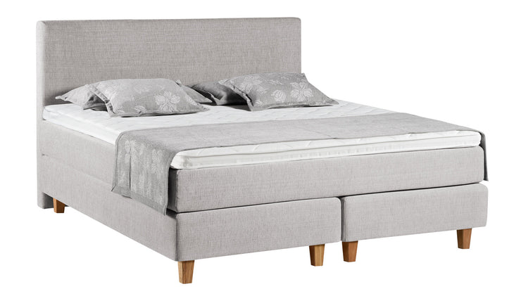 Kuvassa on Aava-sängynpäädyn lisäksi erikseen myytävä Aava Limited Edition -jenkkisänky, väri beige.