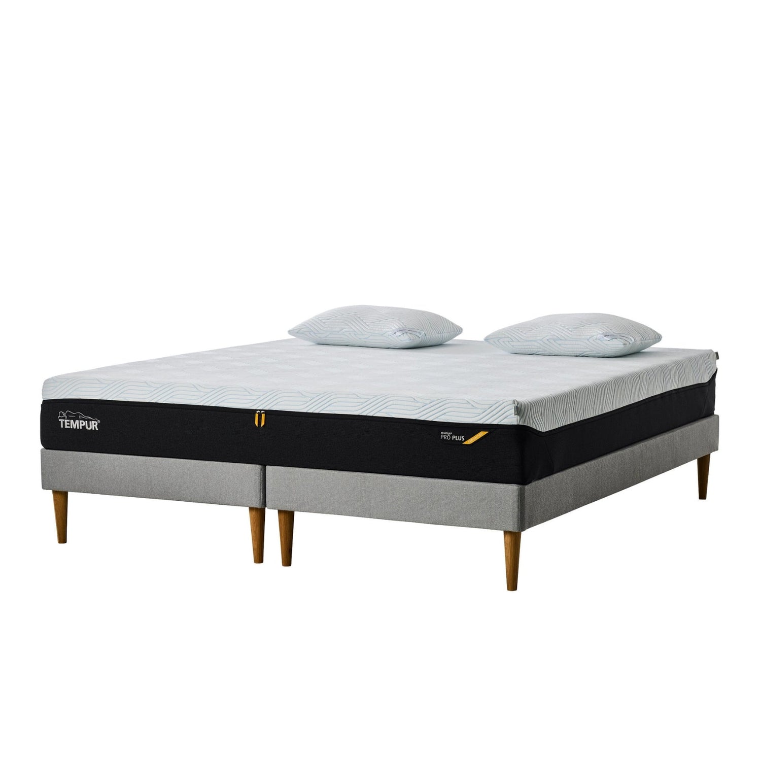 TEMPUR® Stay -vuoderungot TEMPUR® Pro 21 SmartCool -patjalla. Sänkypaketissa on 19 cm tammijalat ja verhoiluna harmaa Stone -kangas. Tyynyt myydään erikseen.