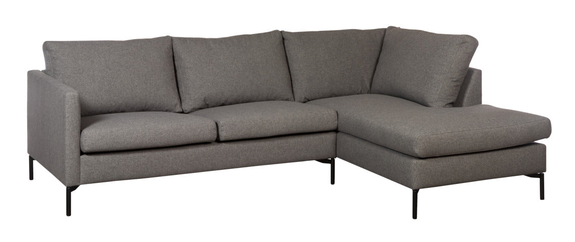 Aulanko-kulmadivaanisohva Stella-kankaalla ja mustilla metallijaloilla.