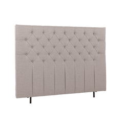 Napillinen 160 cm leveä Hilding Cross -sängynpääty korokejaloilla beigenä.