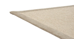 Lähikuva beigen värisestä Esmeralda villa-paperimatosta.