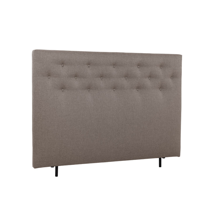 Napillinen 160 cm leveä Hilding Feel -sängynpääty korokejaloilla hiekanvärisenä.