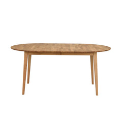 Ovaalin muotoinen jatkettava Filippa-ruokapöytä 170 x 105 cm tammen värisenä.