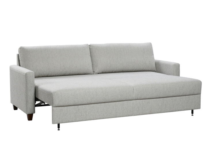 Free-sohvan levittäminen vuoteeksi käy käden käänteessä. Free-vuodesohvassa on vakiona valkoisella kankaalla verhoiltu levitysosa. Tässä kuvan sohvassa levitysosa on verhoiltu samalla kankaalla, kuin sohva, mikä on lisähintainen ominaisuus.