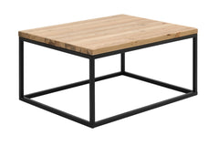 Hanko-sohvapöytä antiikin värisellä mäntykannella ja mustalla jalkakehikolla.