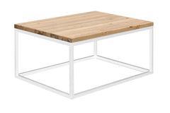 Hanko-sohvapöytä antiikin värisellä mäntykannella ja valkoisella jalkakehikolla.