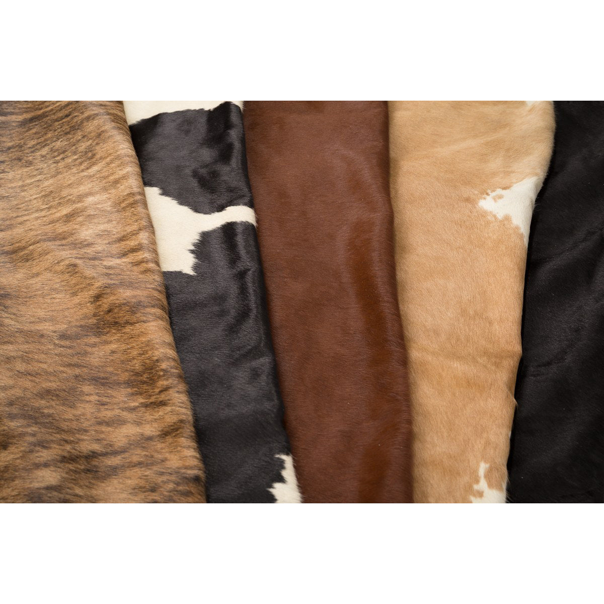 Kuvassa on kaikki Mattokympin häräntaljojen värivaihtoehdot. Talja on aina uniikki, joten väreissä esiintyy vaihtelua.