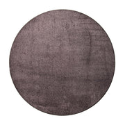 Pyöreä Hattara-matto tummanharmaana.