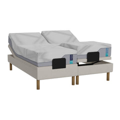 Valkoinen Heaven By Unico Elite -moottorisänkypaketti 160 x 200 cm. Pakettiin kuuluu 2 kpl Suomessa valmistettua, portaattomasti säädettävää 80 cm leveää Lounge-moottorisänkyä, 2 kpl 80 x 200 cm Elite Air Feel™ memory foam patjaa sekä pyöreät tammen väriset jalat.